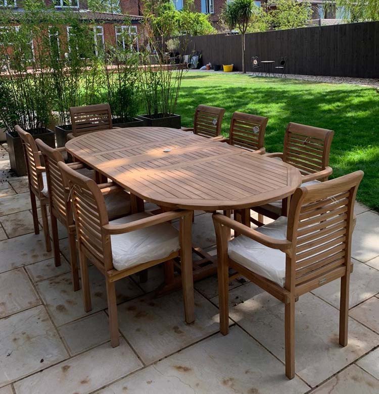 Teak garden dining set is amazing value - double extending table 1.8m to 2.4m, 8 x teak stacking chairs, free 3m parasol and cushions